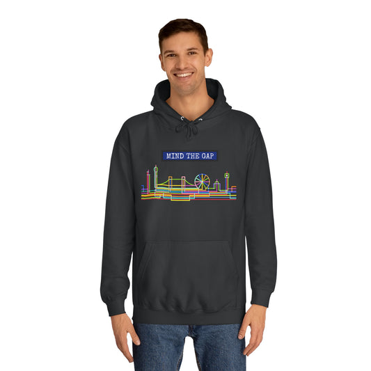 Person wearing a black hoodie with colorful graphic design and text on a white background